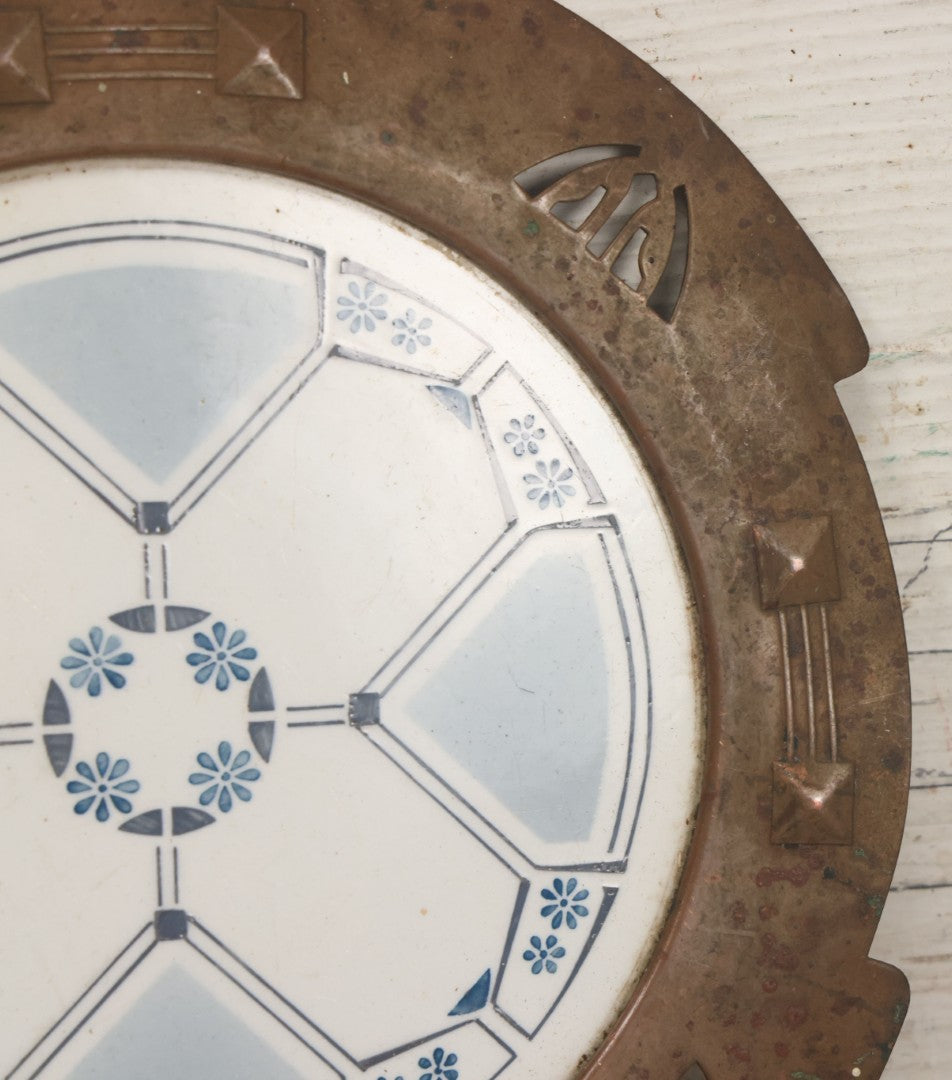 Lot 056 - Antique Art Deco Trivet With Porcelain Center And Pressed Copper Surround, Note Scuffs, Scratches