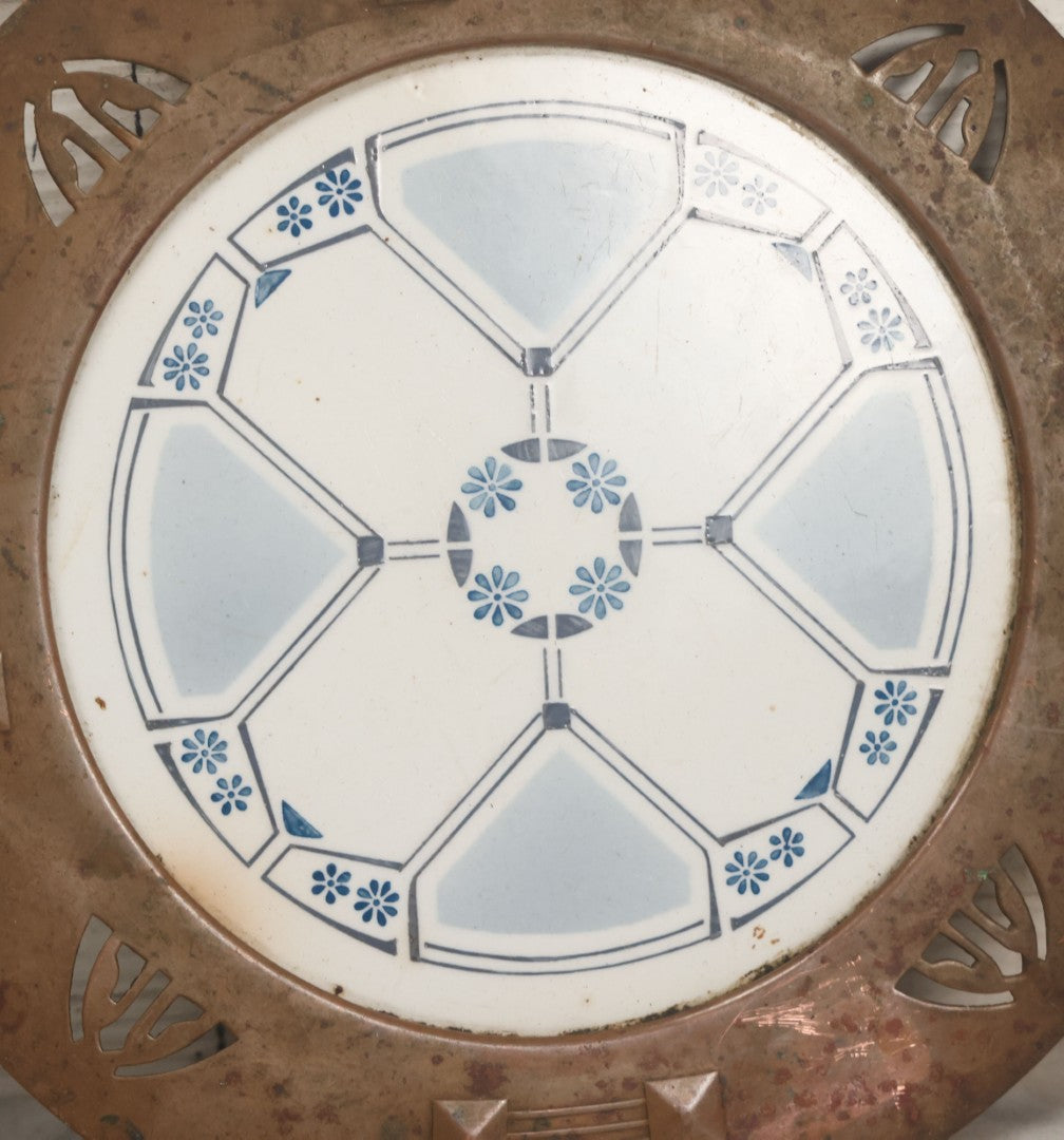 Lot 056 - Antique Art Deco Trivet With Porcelain Center And Pressed Copper Surround, Note Scuffs, Scratches