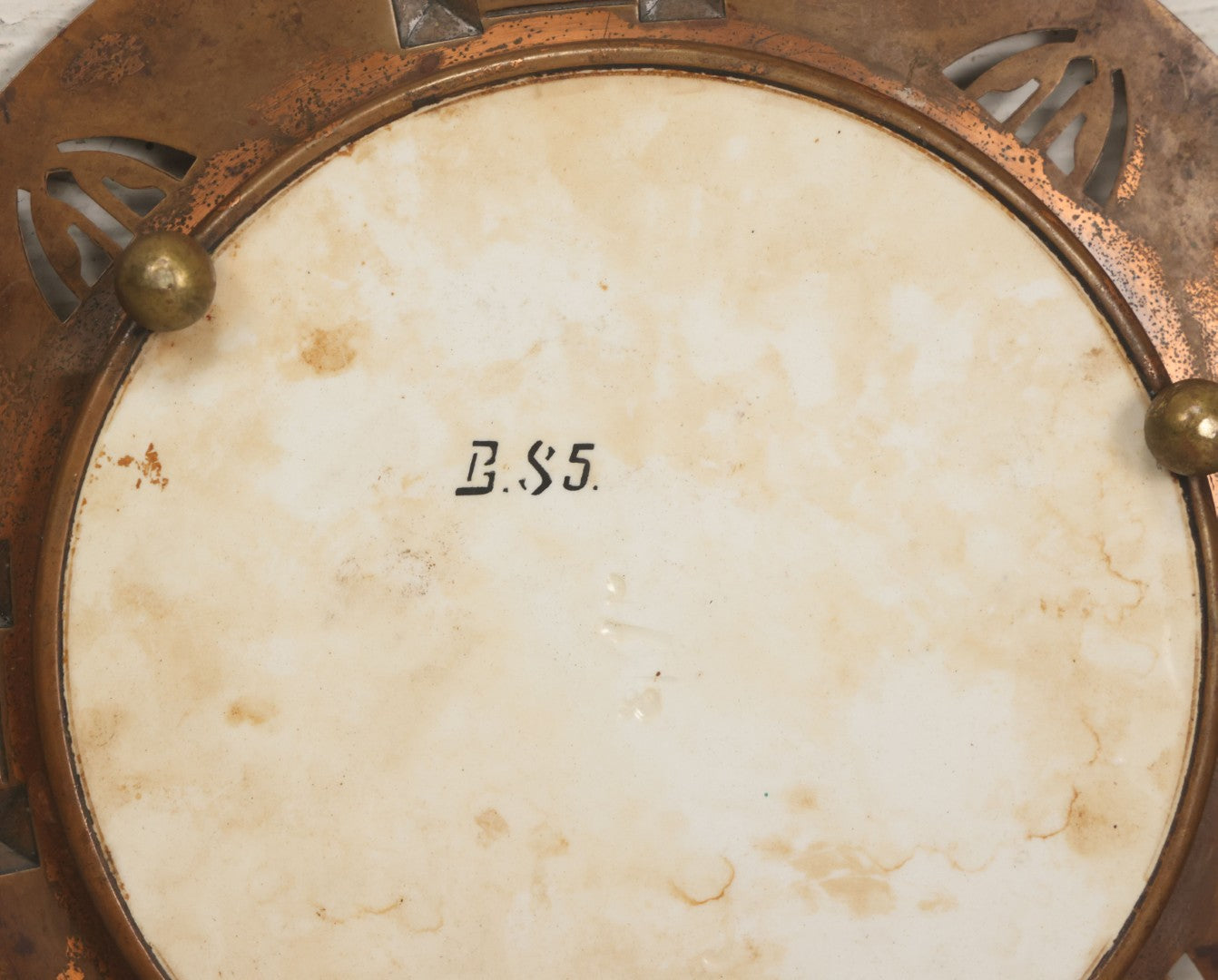 Lot 056 - Antique Art Deco Trivet With Porcelain Center And Pressed Copper Surround, Note Scuffs, Scratches