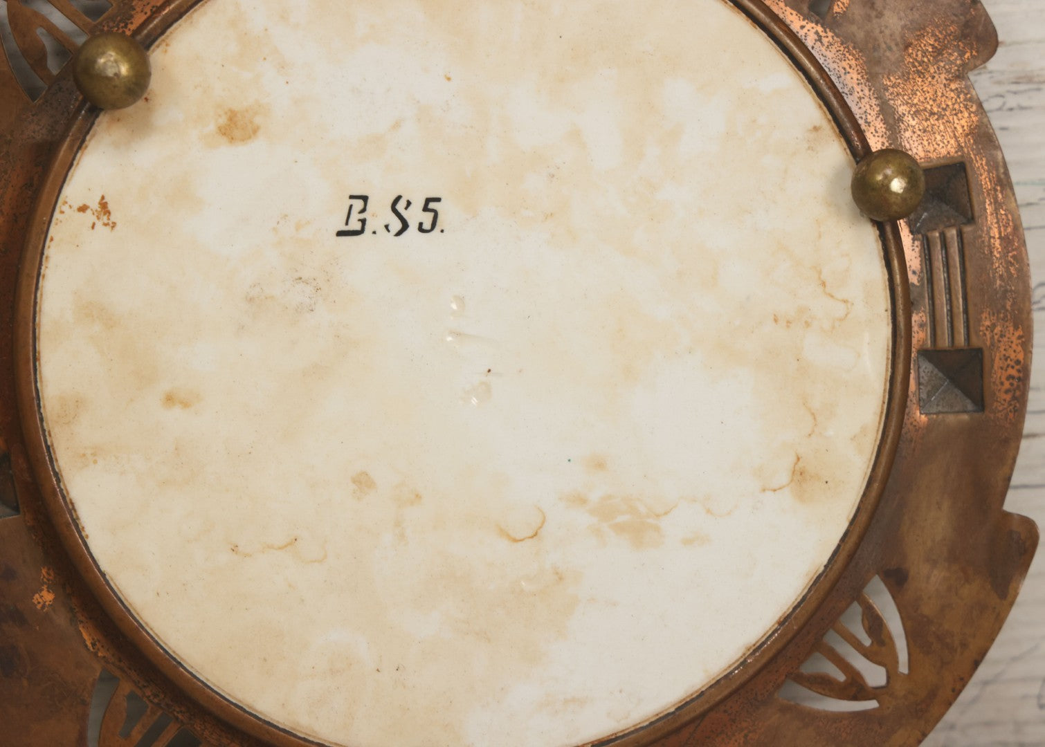 Lot 056 - Antique Art Deco Trivet With Porcelain Center And Pressed Copper Surround, Note Scuffs, Scratches