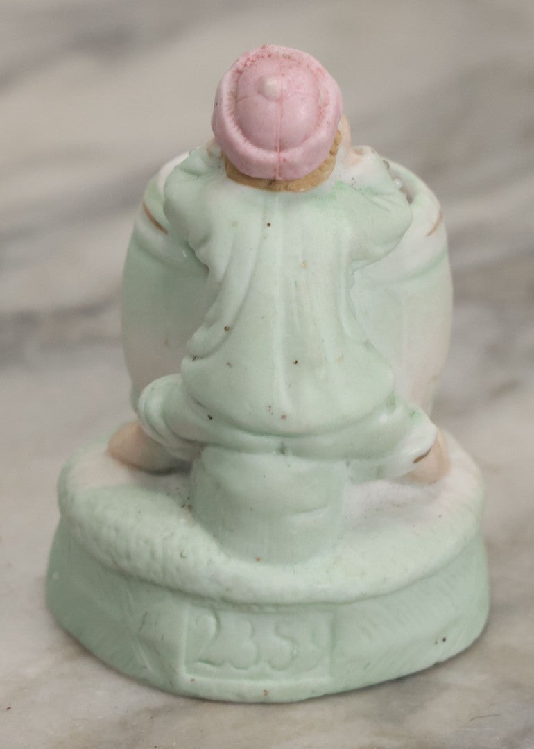 Lot 062 - Antique Bisque Toothpick Holder With Little Boy In Pink Hat Leaning On Barrel, Likely Made In Germany, Marked No. 2359