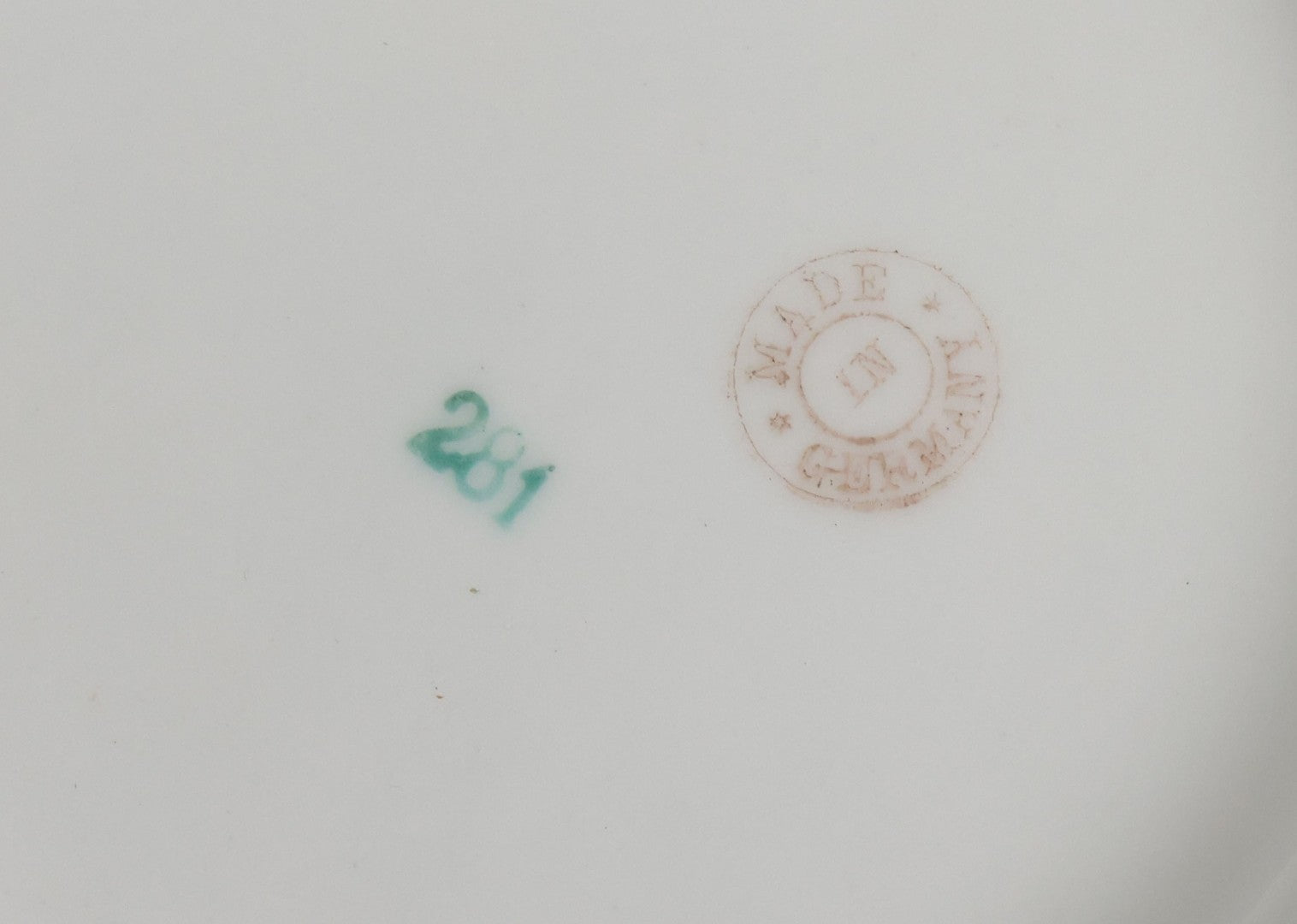 Lot 063 - Antique Porcelain Plate With Boy Peeing "Good Luck" Message In Snow With His Pet Pig, Souvenir Of Gileghenny, Pennsylvania, Made In Germany, No. 281, 6-3/8" Diameter