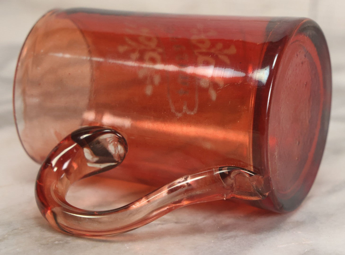 Lot 066 - Antique Ruby Glass Mug With Hand Etched, Hand Painted Details, "A Present" With Flowers, Note Chip To Bottom Of Handle, Rim