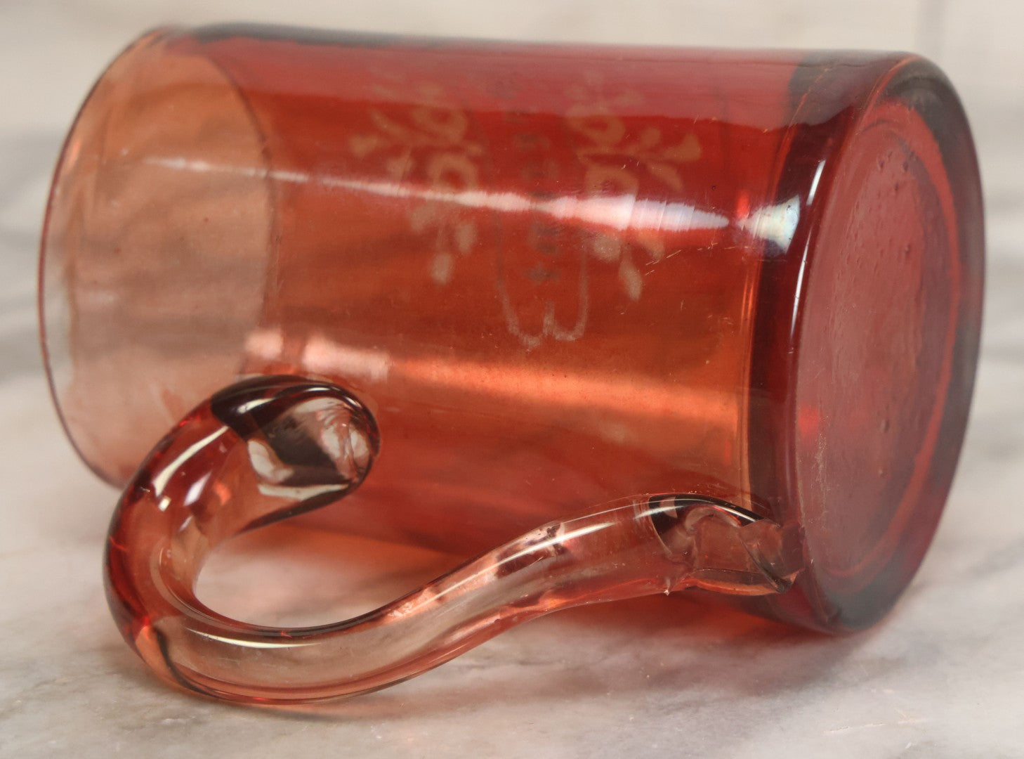 Lot 066 - Antique Ruby Glass Mug With Hand Etched, Hand Painted Details, "A Present" With Flowers, Note Chip To Bottom Of Handle, Rim