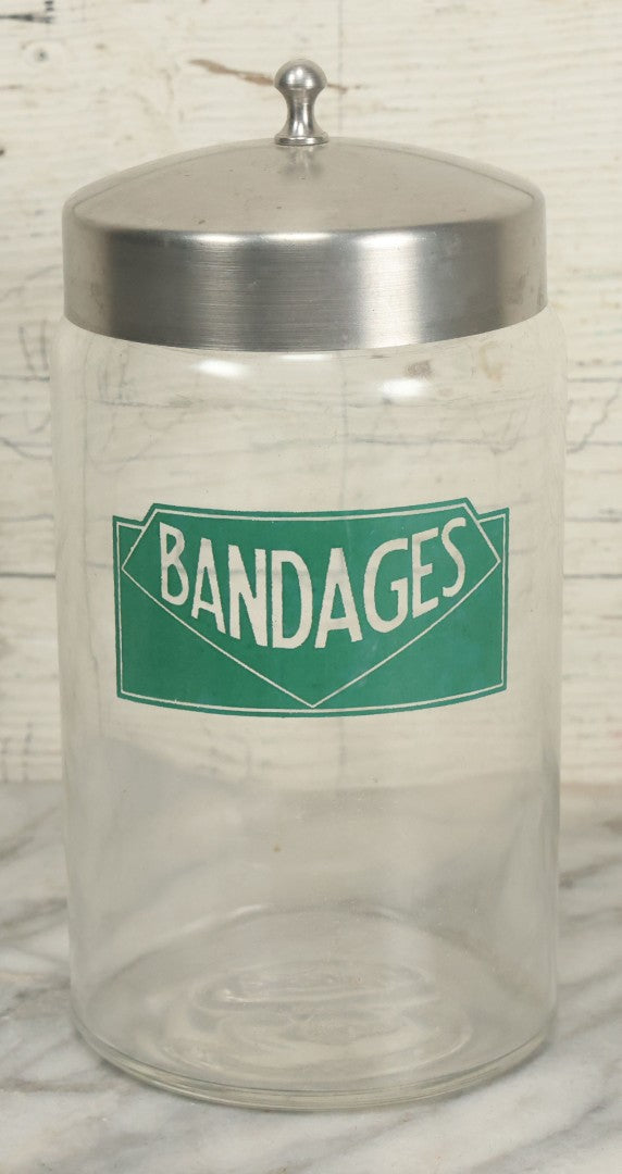Lot 071 - Vintage Medical Doctors Office Bandages Glass Jar With Green Label And Lid, Manufactured By Profex, U.S.A.