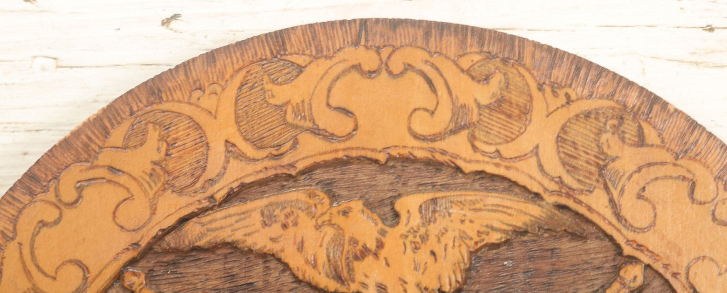 Lot 076 - Antique Wood Burned Pyrography Wall Hanging Plaque For The Foresters Of America, Fraternal Order, With Eagle And American Flags, Flemish Art Co., New York, No. 854, 14-3/4" Diameter
