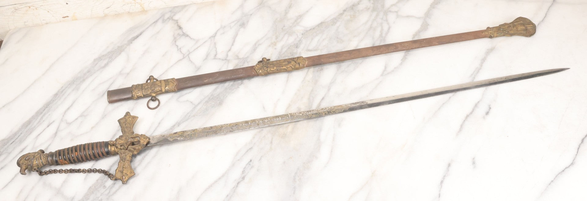 Lot 002 - Antique Fraternal "Select Knight" Masonic Ceremonial Presentation Sword, With Skeleton Hand, Eagle, And Axes Motifs, Manufactured By Parson And Co. St. Louis Missouri