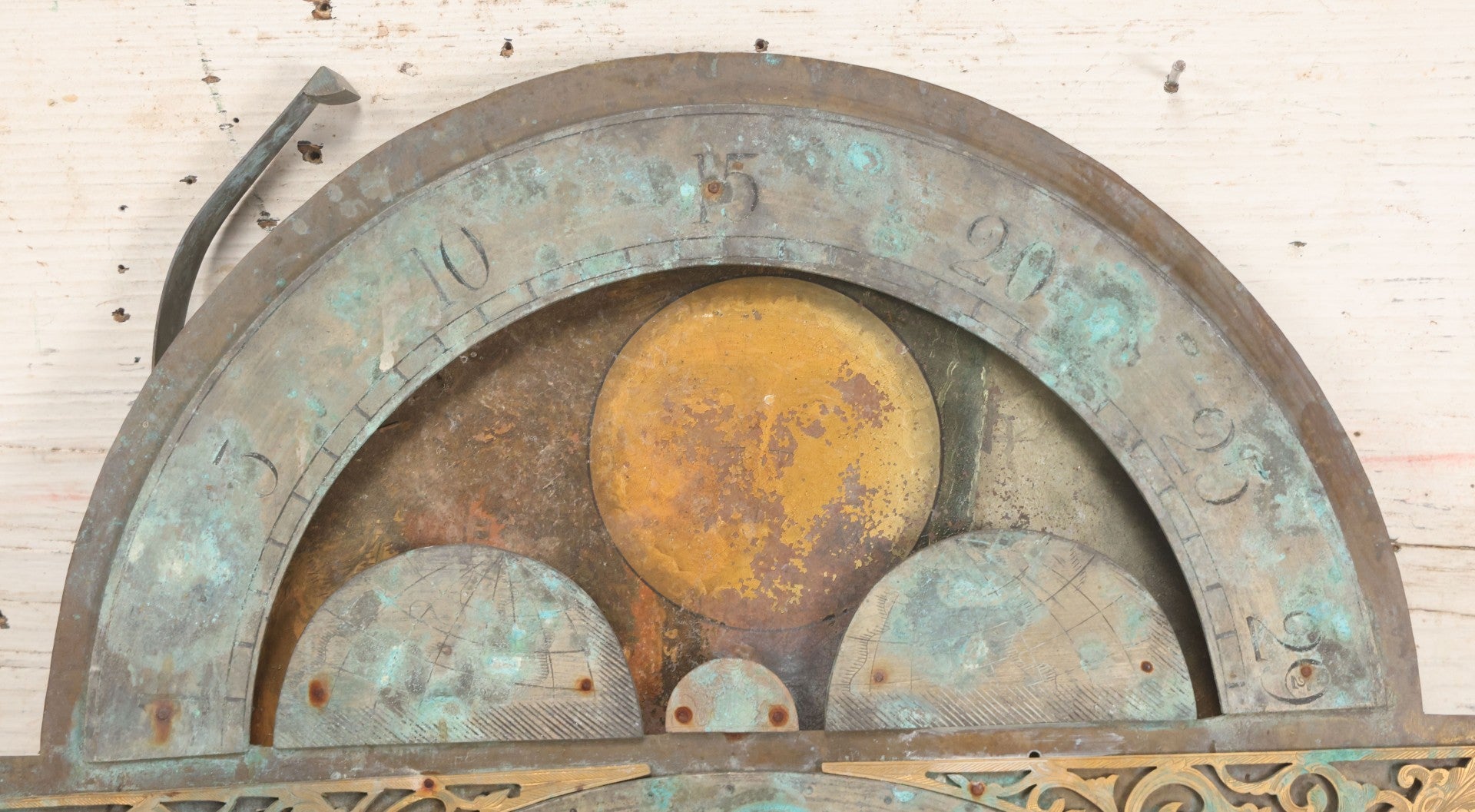 Lot 007 - Antique Brass Clock Face With Hand Painted Details Including Moon, Sun, Ships At Sea, And Buildings On Land, Manufactured By S.D. Neil, Belfast, Ireland, Dated 1896, Note Heavy Wear And Patina, 13" x 18-1/2"