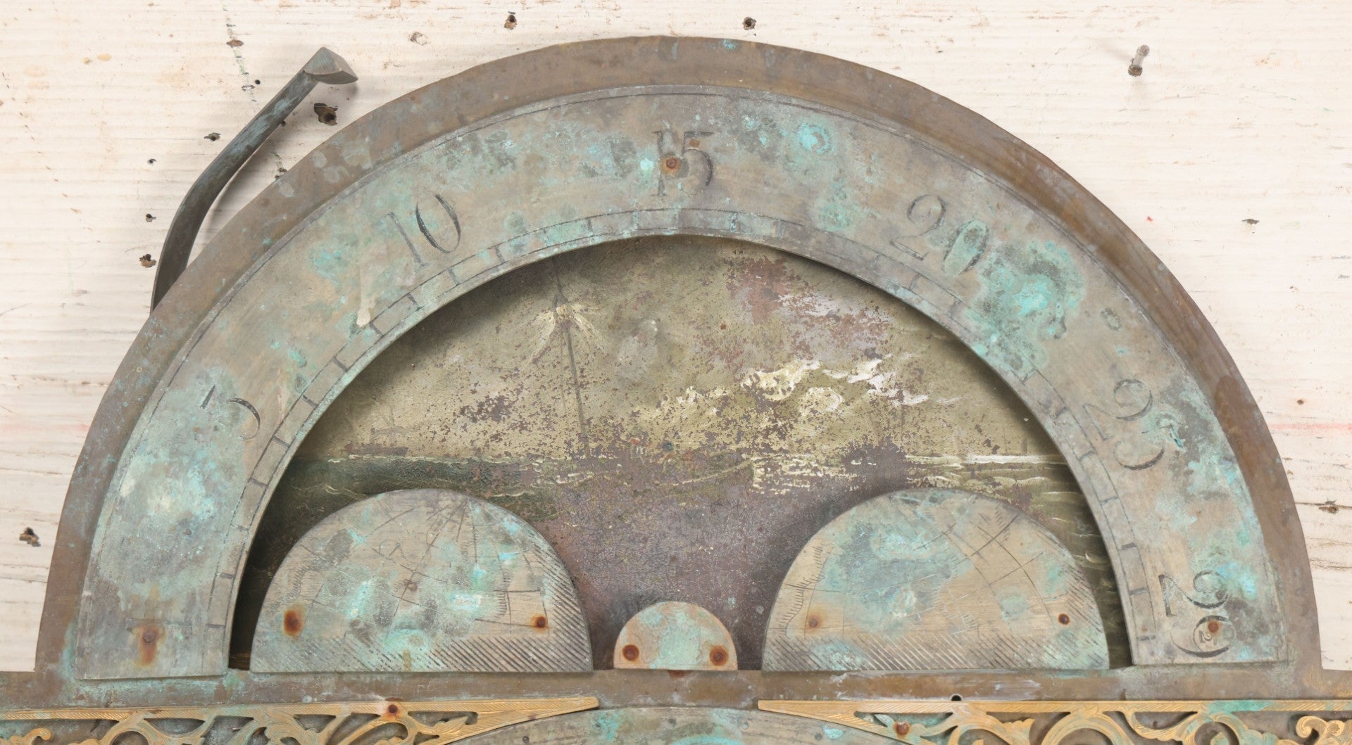 Lot 007 - Antique Brass Clock Face With Hand Painted Details Including Moon, Sun, Ships At Sea, And Buildings On Land, Manufactured By S.D. Neil, Belfast, Ireland, Dated 1896, Note Heavy Wear And Patina, 13" x 18-1/2"