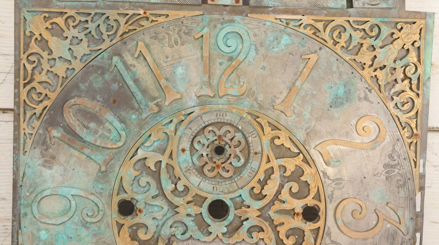 Lot 007 - Antique Brass Clock Face With Hand Painted Details Including Moon, Sun, Ships At Sea, And Buildings On Land, Manufactured By S.D. Neil, Belfast, Ireland, Dated 1896, Note Heavy Wear And Patina, 13" x 18-1/2"