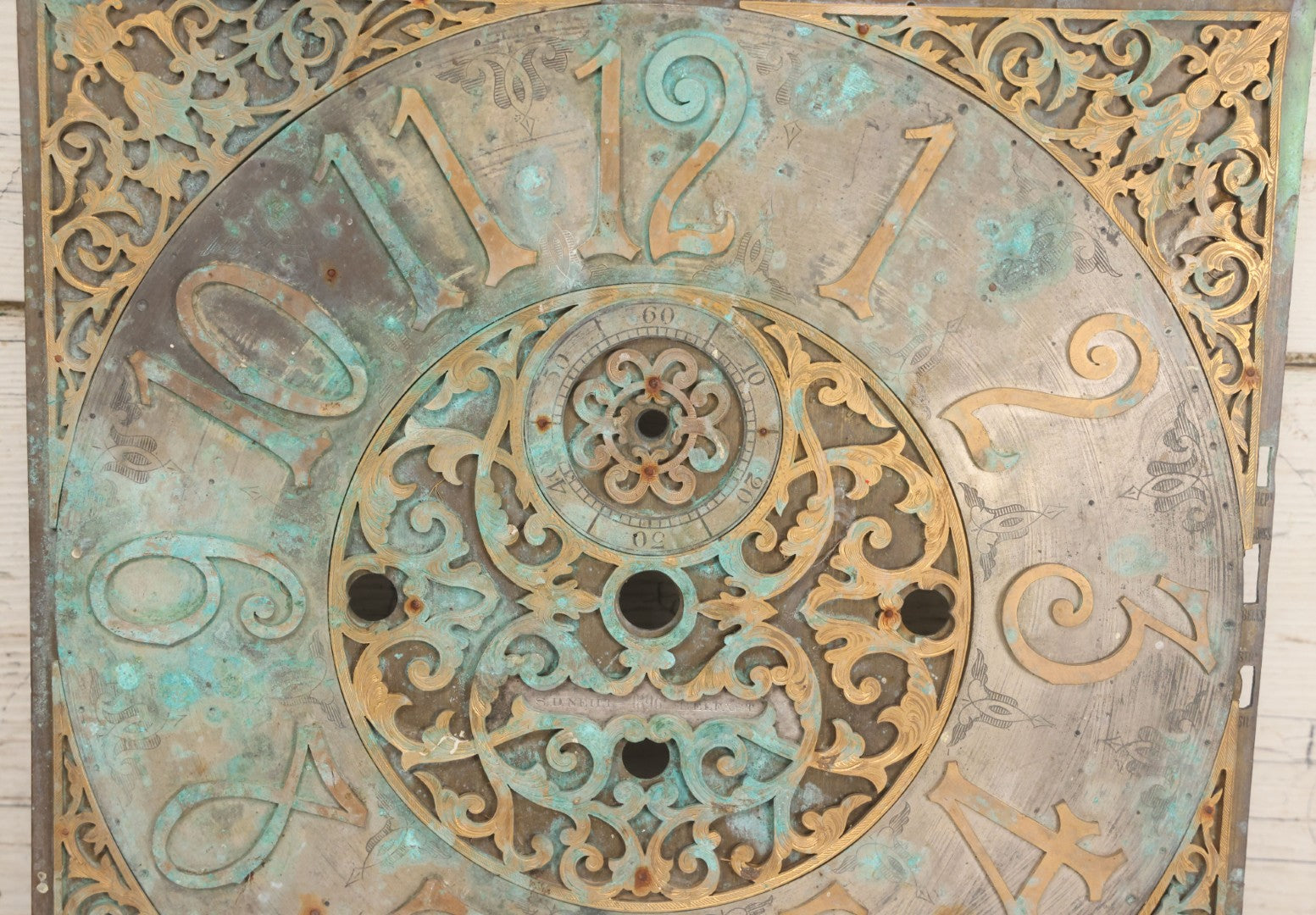 Lot 007 - Antique Brass Clock Face With Hand Painted Details Including Moon, Sun, Ships At Sea, And Buildings On Land, Manufactured By S.D. Neil, Belfast, Ireland, Dated 1896, Note Heavy Wear And Patina, 13" x 18-1/2"