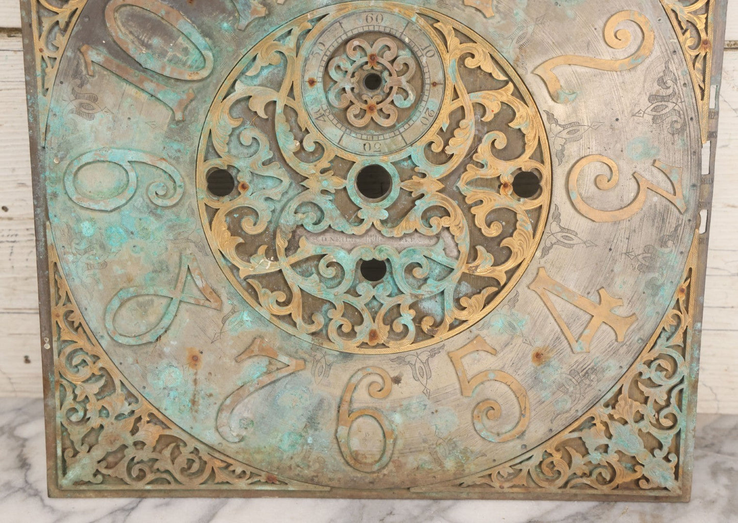 Lot 007 - Antique Brass Clock Face With Hand Painted Details Including Moon, Sun, Ships At Sea, And Buildings On Land, Manufactured By S.D. Neil, Belfast, Ireland, Dated 1896, Note Heavy Wear And Patina, 13" x 18-1/2"