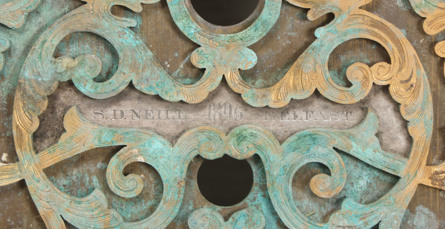 Lot 007 - Antique Brass Clock Face With Hand Painted Details Including Moon, Sun, Ships At Sea, And Buildings On Land, Manufactured By S.D. Neil, Belfast, Ireland, Dated 1896, Note Heavy Wear And Patina, 13" x 18-1/2"