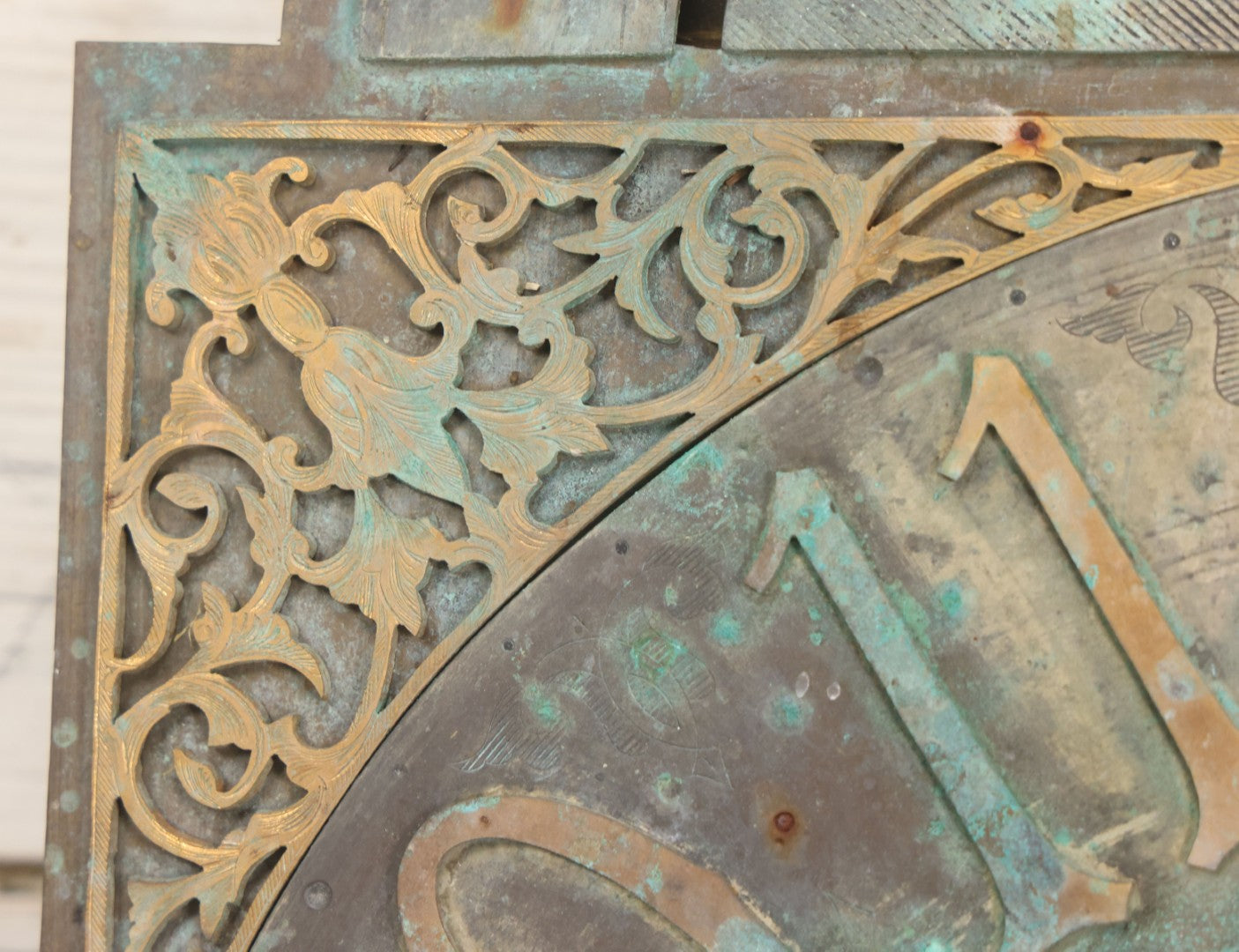 Lot 007 - Antique Brass Clock Face With Hand Painted Details Including Moon, Sun, Ships At Sea, And Buildings On Land, Manufactured By S.D. Neil, Belfast, Ireland, Dated 1896, Note Heavy Wear And Patina, 13" x 18-1/2"