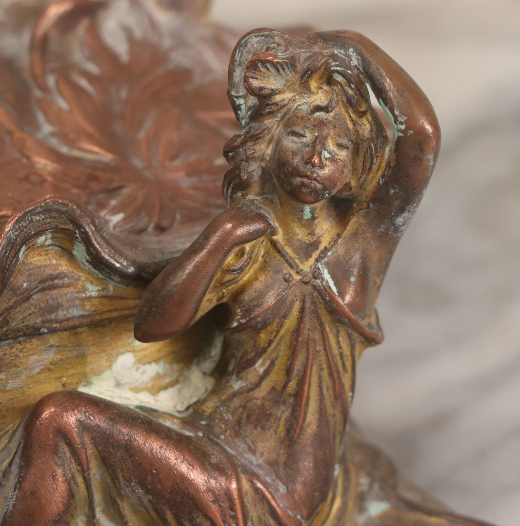 Lot 010 - Antique Art Nouveau Pot Metal Jewelry Casket With Figural Girl In Gown, Floral Motif, Tufted Red Interior, Bottom Marked M.R., Note Hinge Broken, Torn Fabric