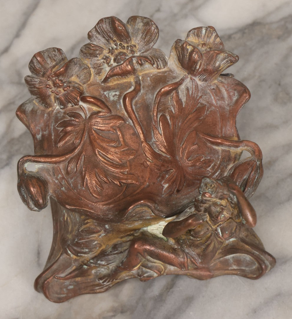 Lot 010 - Antique Art Nouveau Pot Metal Jewelry Casket With Figural Girl In Gown, Floral Motif, Tufted Red Interior, Bottom Marked M.R., Note Hinge Broken, Torn Fabric