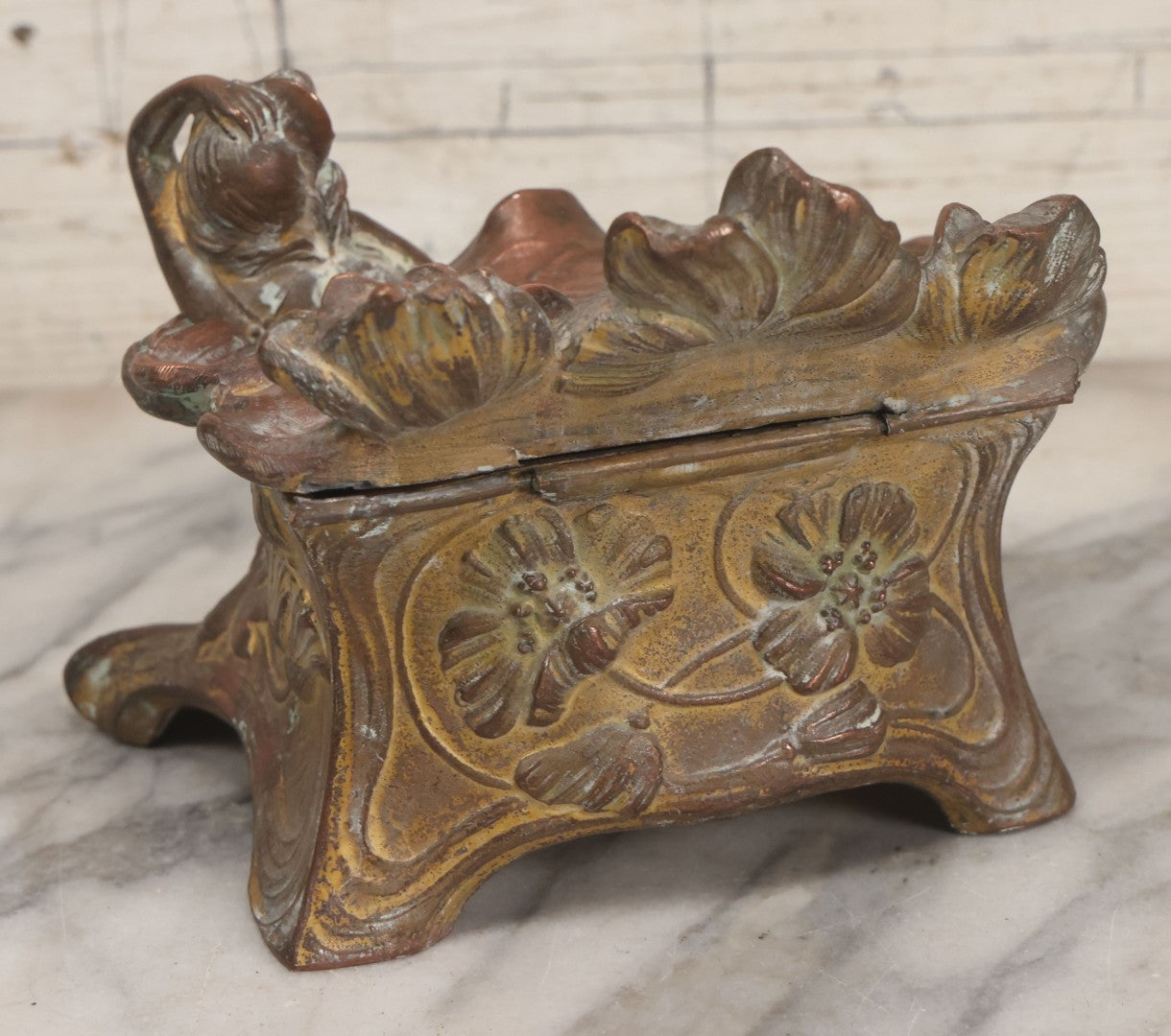 Lot 010 - Antique Art Nouveau Pot Metal Jewelry Casket With Figural Girl In Gown, Floral Motif, Tufted Red Interior, Bottom Marked M.R., Note Hinge Broken, Torn Fabric