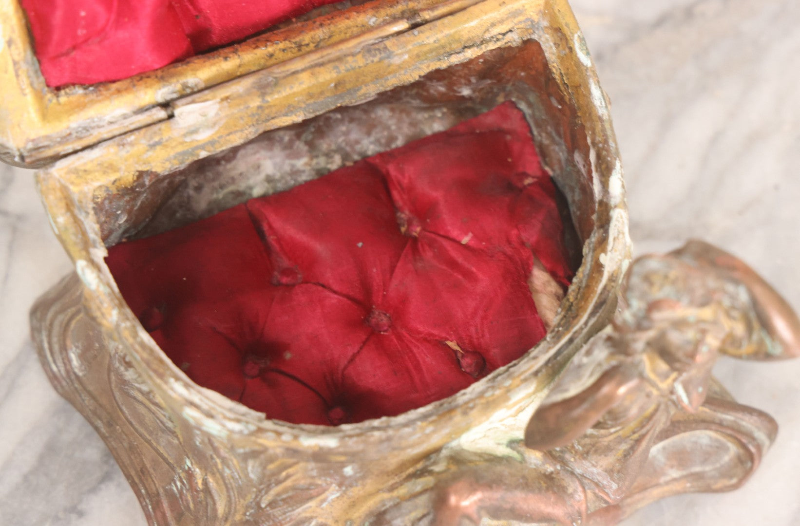 Lot 010 - Antique Art Nouveau Pot Metal Jewelry Casket With Figural Girl In Gown, Floral Motif, Tufted Red Interior, Bottom Marked M.R., Note Hinge Broken, Torn Fabric