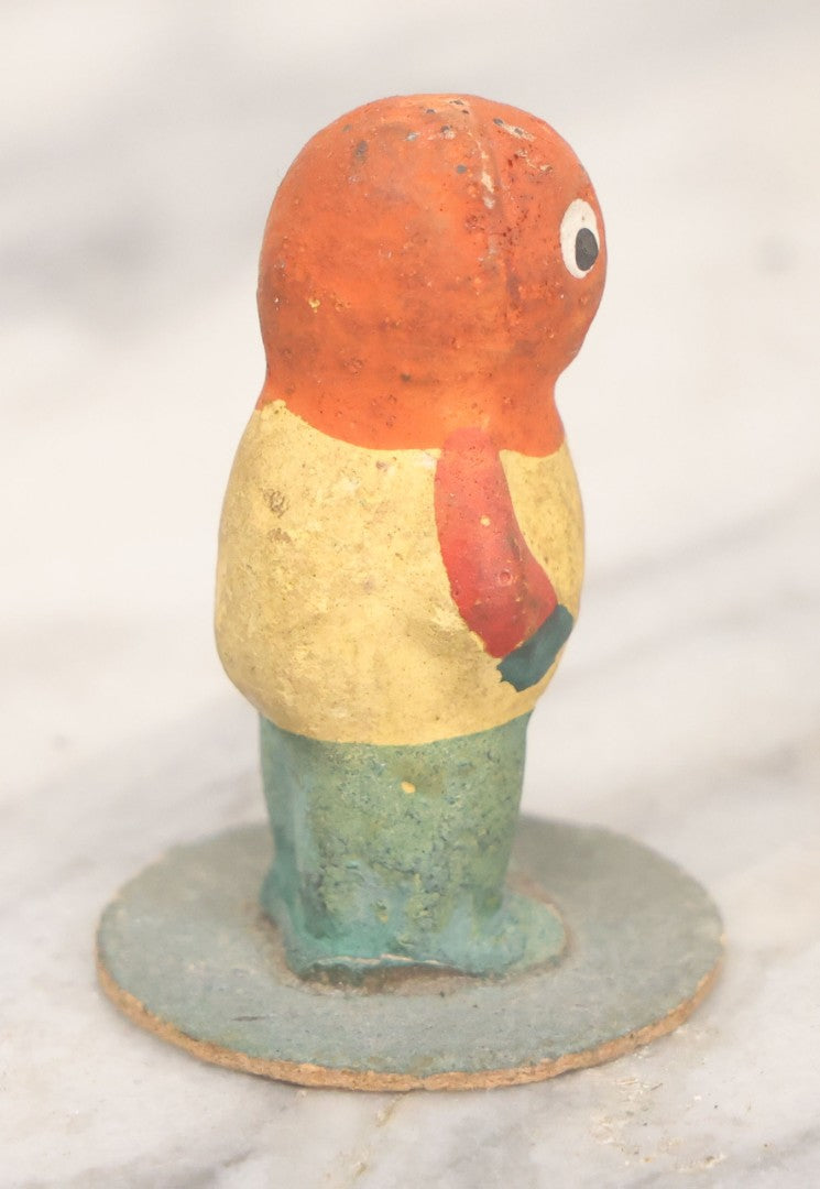 Lot 011 - Antique Papier Mache Halloween Pumpkin Man Figure On Paper Board Base, Marked Germany, Height 1-3/4"