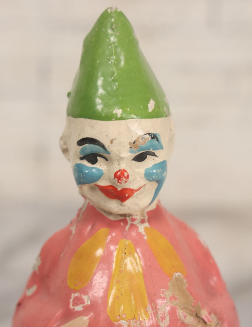Lot 013 - Antique Papier Mache Clown Roly Poly Toy With Pink Body, Blue Makeup And Green Hat, Note Wear And Tear Throughout, Height 6"