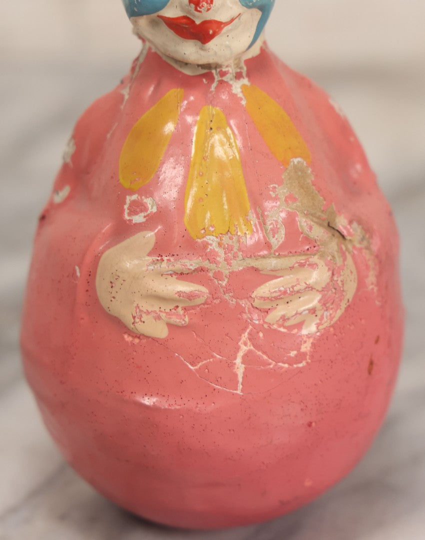 Lot 013 - Antique Papier Mache Clown Roly Poly Toy With Pink Body, Blue Makeup And Green Hat, Note Wear And Tear Throughout, Height 6"