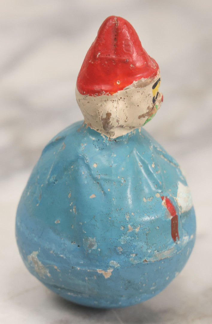 Lot 014 - Antique Papier Mache Clown Roly Poly Toy With Blue Body, Green And Yellow Makeup And Red Hat, Note Wear And Tear Throughout, Height 3-3/4"