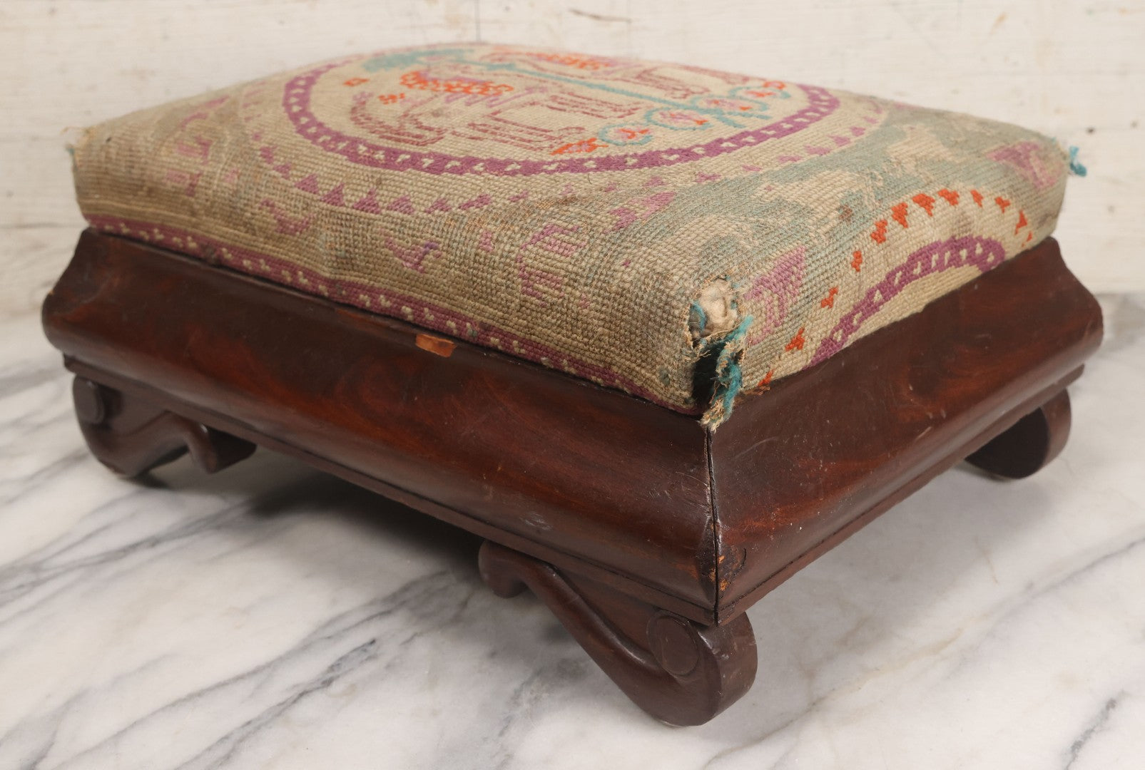 Lot 029 - Antique Victorian Wooden Footstool With Folk Art Needlepoint Seat Cover With Griffins And Tree Of Life Motif, Geometric Designs, Note Worn Corners 