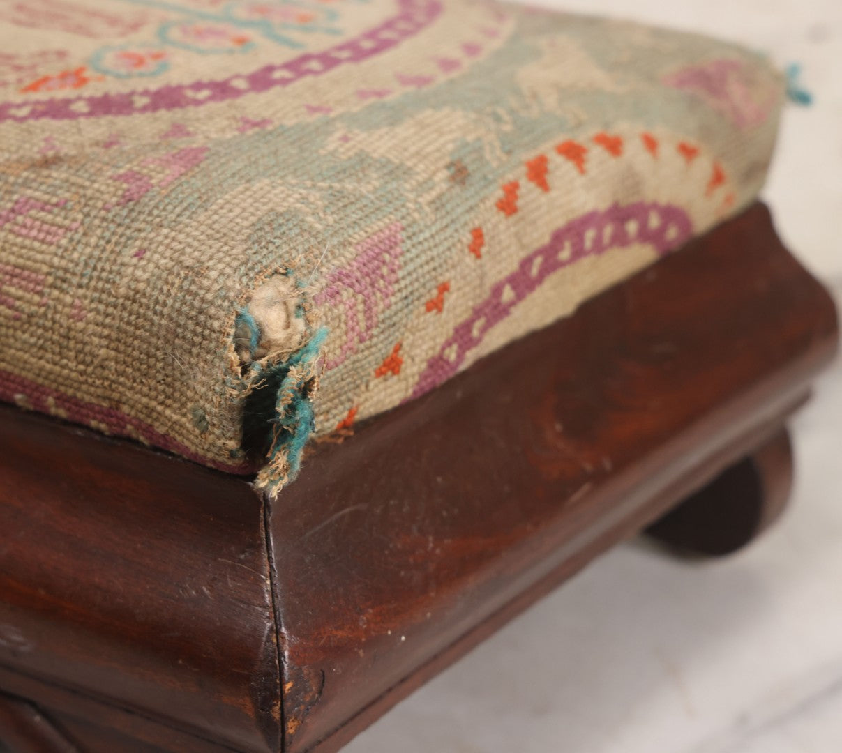 Lot 029 - Antique Victorian Wooden Footstool With Folk Art Needlepoint Seat Cover With Griffins And Tree Of Life Motif, Geometric Designs, Note Worn Corners 