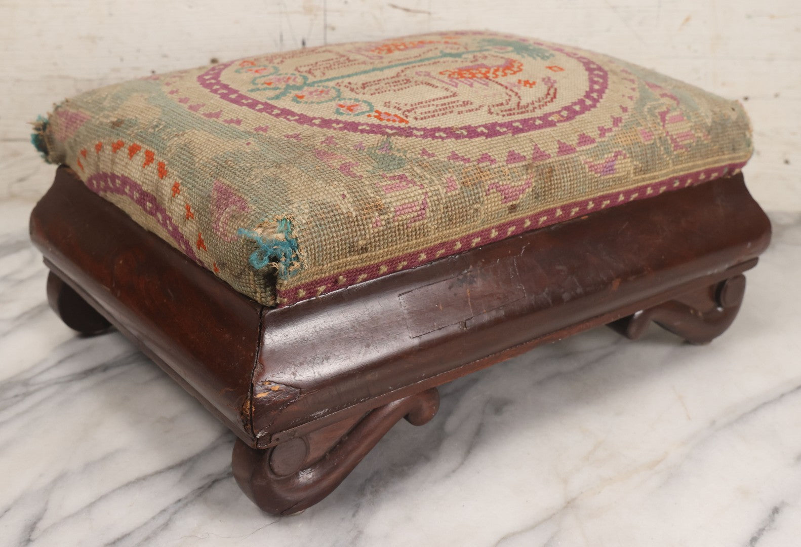 Lot 029 - Antique Victorian Wooden Footstool With Folk Art Needlepoint Seat Cover With Griffins And Tree Of Life Motif, Geometric Designs, Note Worn Corners 