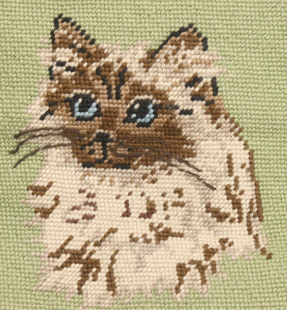 Lot 030 - Vintage Handmade Needlepoint Pillow With Fluffy Himalayan Cat On Green Background With Maroon Fabric Backing, 12" x 14"