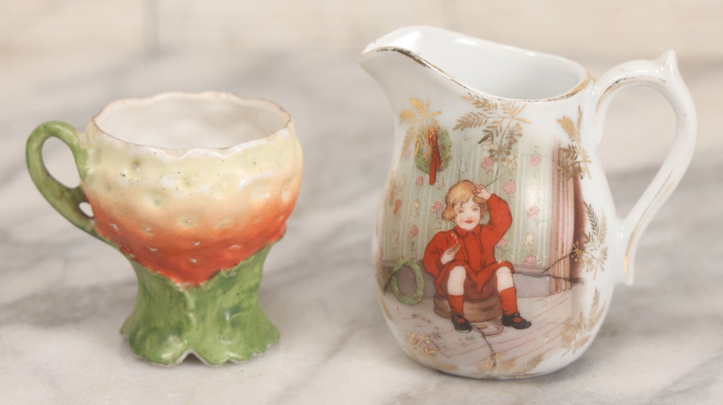 Lot 038 - Pair Of Porcelain Tea Party Pieces Including Little Jack Horner Creamer, And Strawberry Teacup