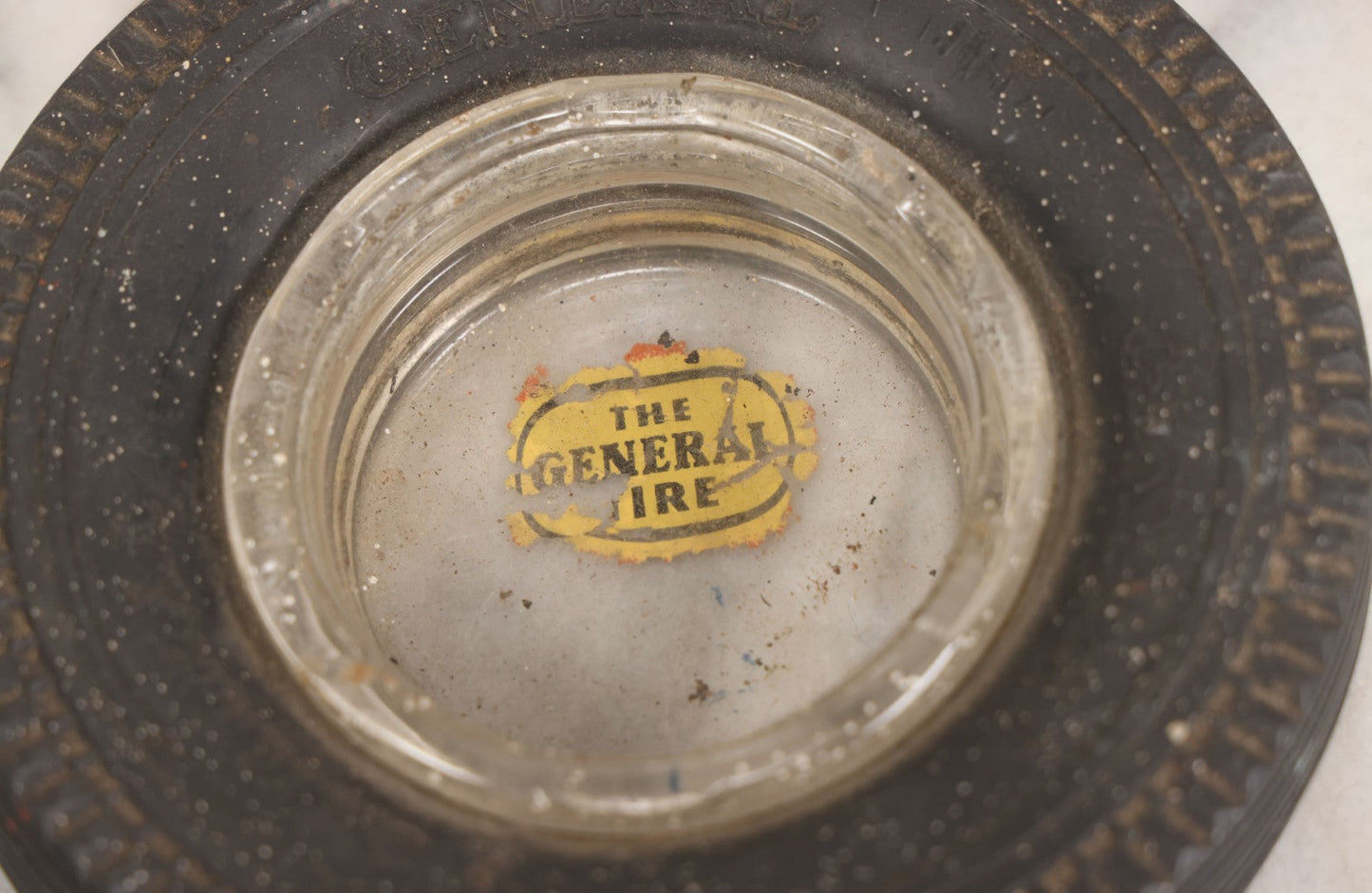 Lot 047 - Vintage Novelty Tire Advertising Ashtray For The General Tire Company, With Reverse Painted Logo, Note Wear And Tear, Paint Speckling Throughout