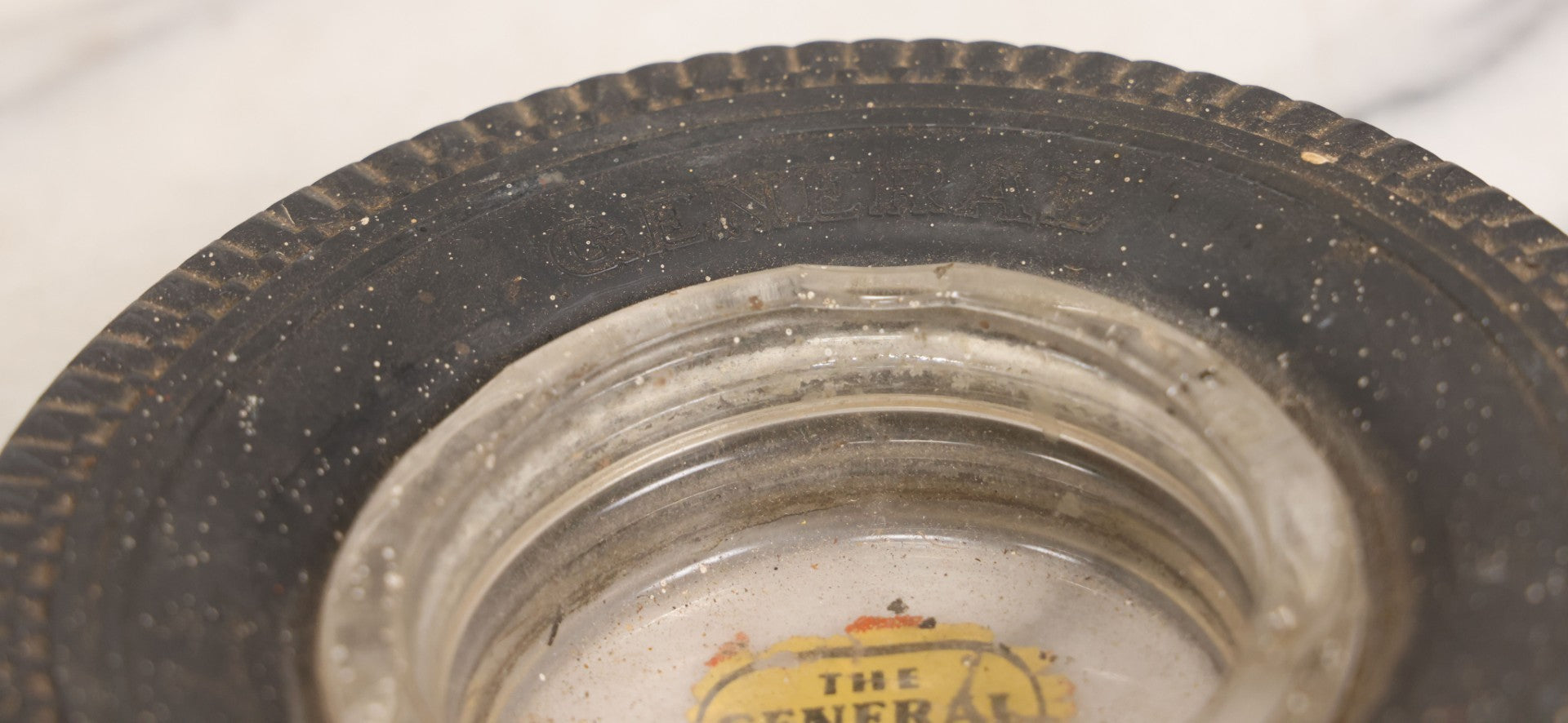 Lot 047 - Vintage Novelty Tire Advertising Ashtray For The General Tire Company, With Reverse Painted Logo, Note Wear And Tear, Paint Speckling Throughout