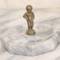 Lot 048 - Vintage Bruxelles Boy, Peeing Child Change Dish/Ashtray With White Marble Base And Cast Metal Figure