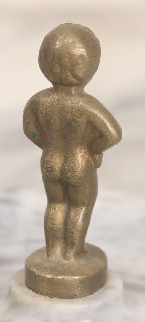Lot 048 - Vintage Bruxelles Boy, Peeing Child Change Dish/Ashtray With White Marble Base And Cast Metal Figure