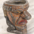Lot 049 - Antique Cast Iron Comic Figural Match Holder With Original Paint, Man With Large Nose Flipping Legs Over Head, Note Worn Paint