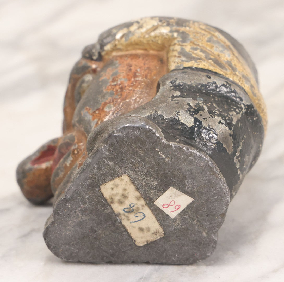 Lot 049 - Antique Cast Iron Comic Figural Match Holder With Original Paint, Man With Large Nose Flipping Legs Over Head, Note Worn Paint