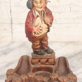 Lot 050 - Vintage Molded Wood Pulp Pipe Stand With Grinning Hobo Holding Stick And Bindle