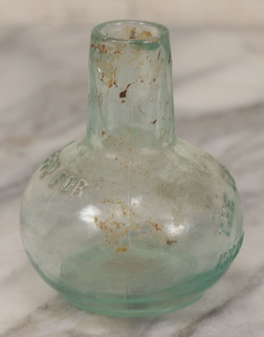 Lot 059 - Pair Of Antique Glass Objects, Including The Trilby Night Lamp And Sanford's Fountain Pen Inks Glass Inkwell