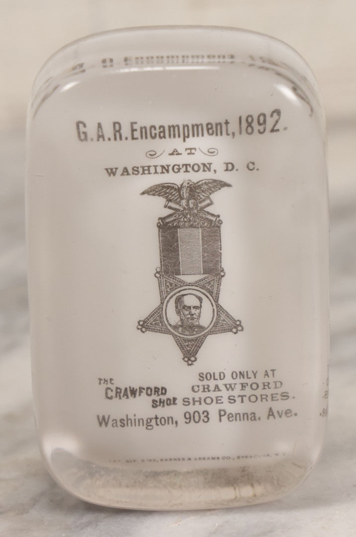 Lot 060 - Antique Glass Paperweight Marking The 1892 Grand Army Of The Republic G.A.R. Encampment, Washington, D.C., Advertising The Crawford Shoe, Manufactured By Barnes & Abrams Co., Syracuse, N.Y., Patented September 5 1892, Note Chipping Around Base