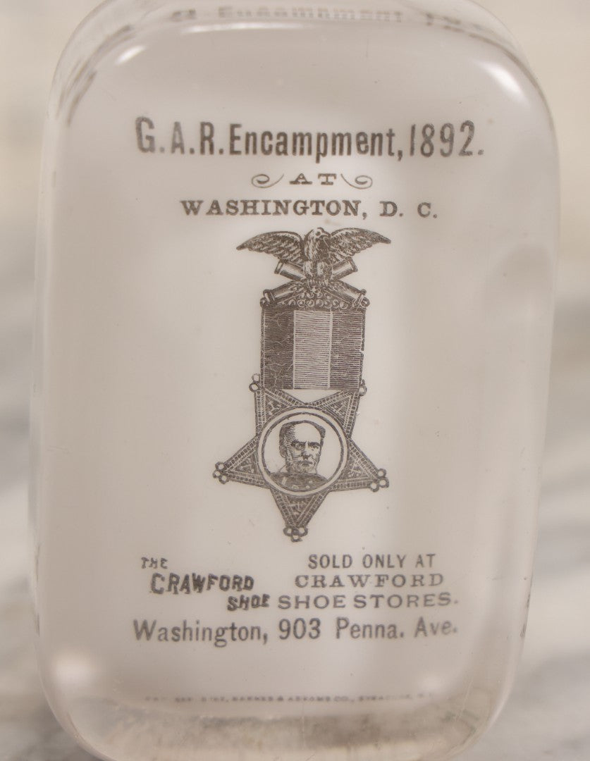 Lot 060 - Antique Glass Paperweight Marking The 1892 Grand Army Of The Republic G.A.R. Encampment, Washington, D.C., Advertising The Crawford Shoe, Manufactured By Barnes & Abrams Co., Syracuse, N.Y., Patented September 5 1892, Note Chipping Around Base