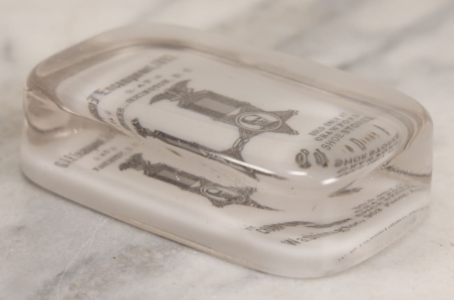 Lot 060 - Antique Glass Paperweight Marking The 1892 Grand Army Of The Republic G.A.R. Encampment, Washington, D.C., Advertising The Crawford Shoe, Manufactured By Barnes & Abrams Co., Syracuse, N.Y., Patented September 5 1892, Note Chipping Around Base