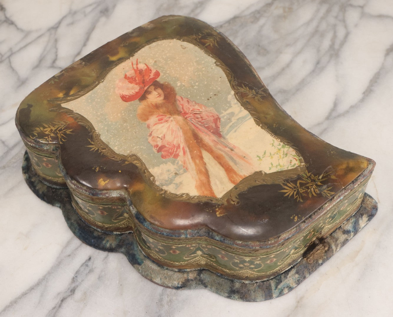 Lot 065 - Antique Victorian Celluloid Dresser Set Box With Woman In Extravagant Pink Coat, Winter Scene On Cover, Note Missing Contents, Various Wear And Tear To Cover