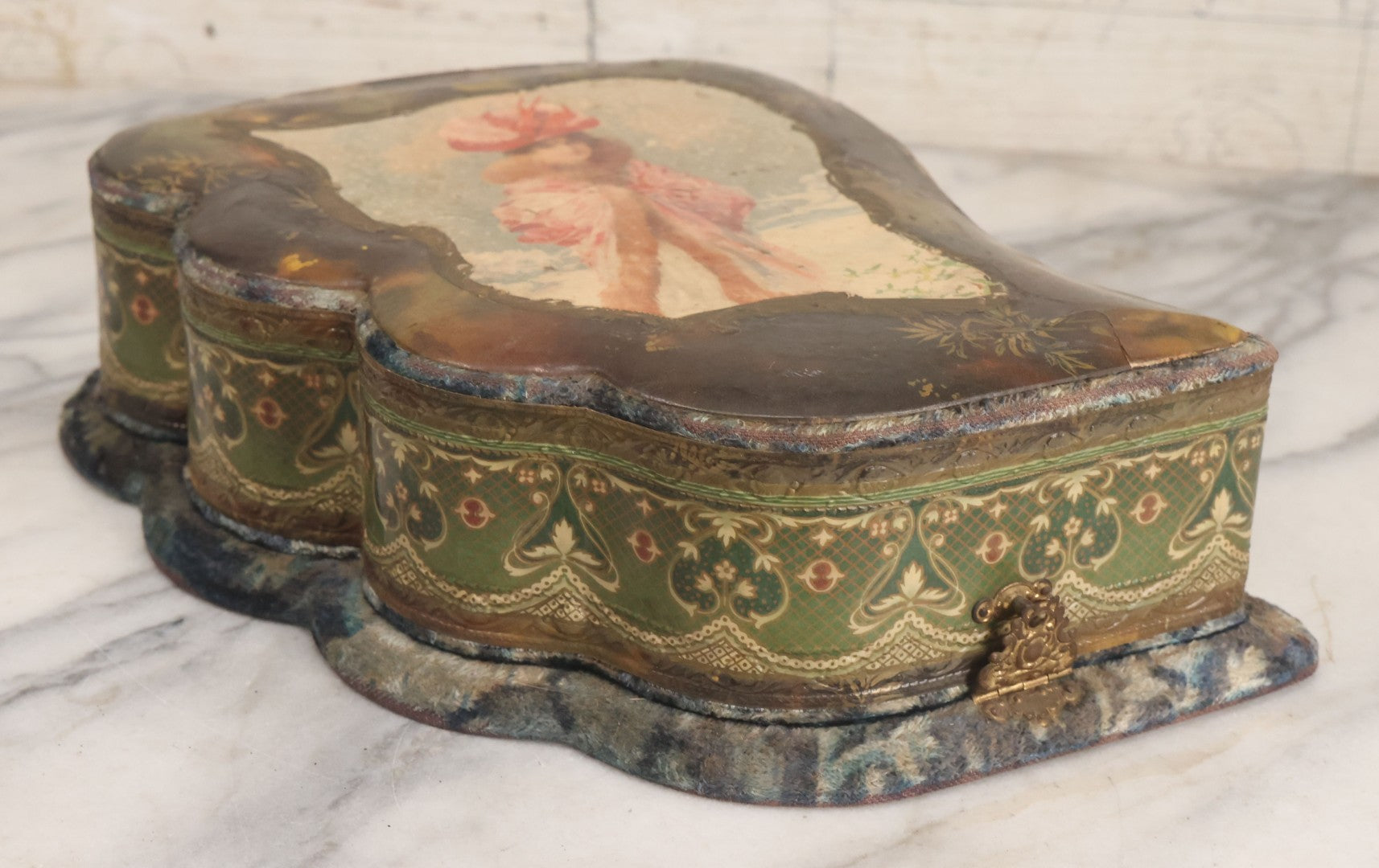 Lot 065 - Antique Victorian Celluloid Dresser Set Box With Woman In Extravagant Pink Coat, Winter Scene On Cover, Note Missing Contents, Various Wear And Tear To Cover