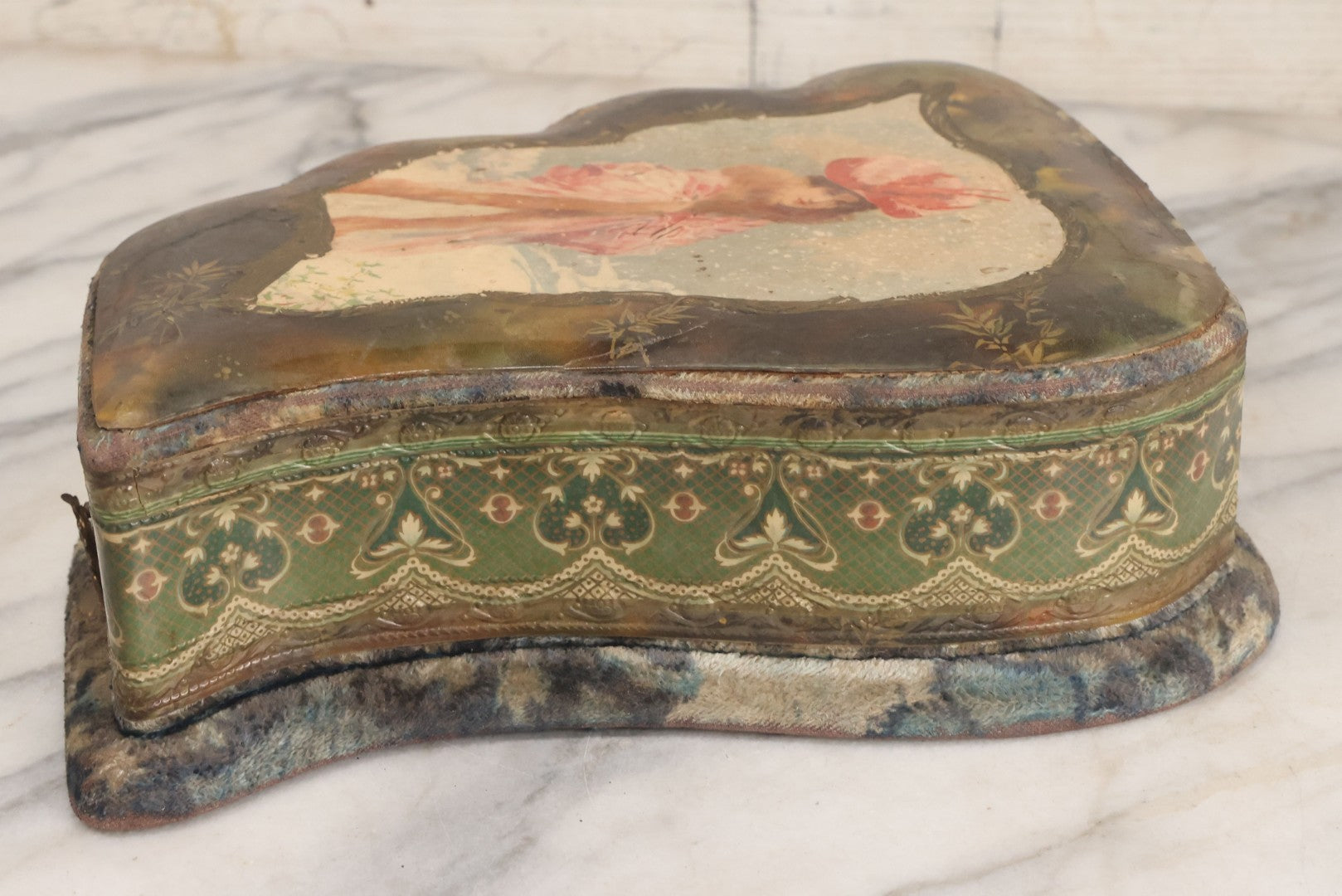 Lot 065 - Antique Victorian Celluloid Dresser Set Box With Woman In Extravagant Pink Coat, Winter Scene On Cover, Note Missing Contents, Various Wear And Tear To Cover