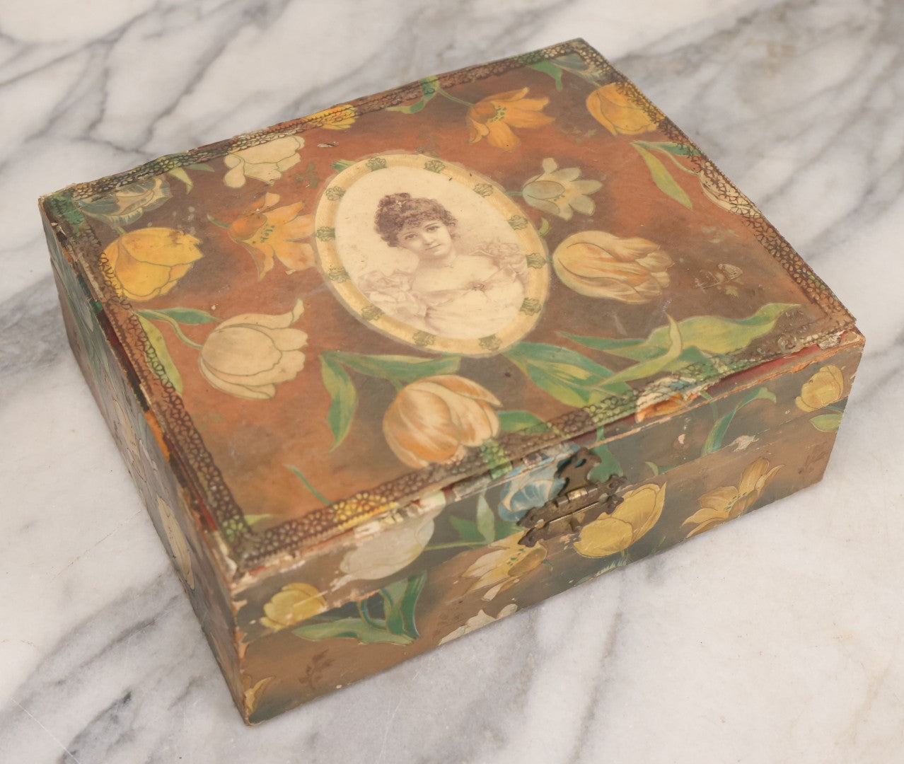 Lot 066 - Antique Victorian Celluloid Dresser Box With Woman In Dress, Floral Pattern On Cover, Tufted Green Interior, Note Cover Separation, Repair Glue Visible