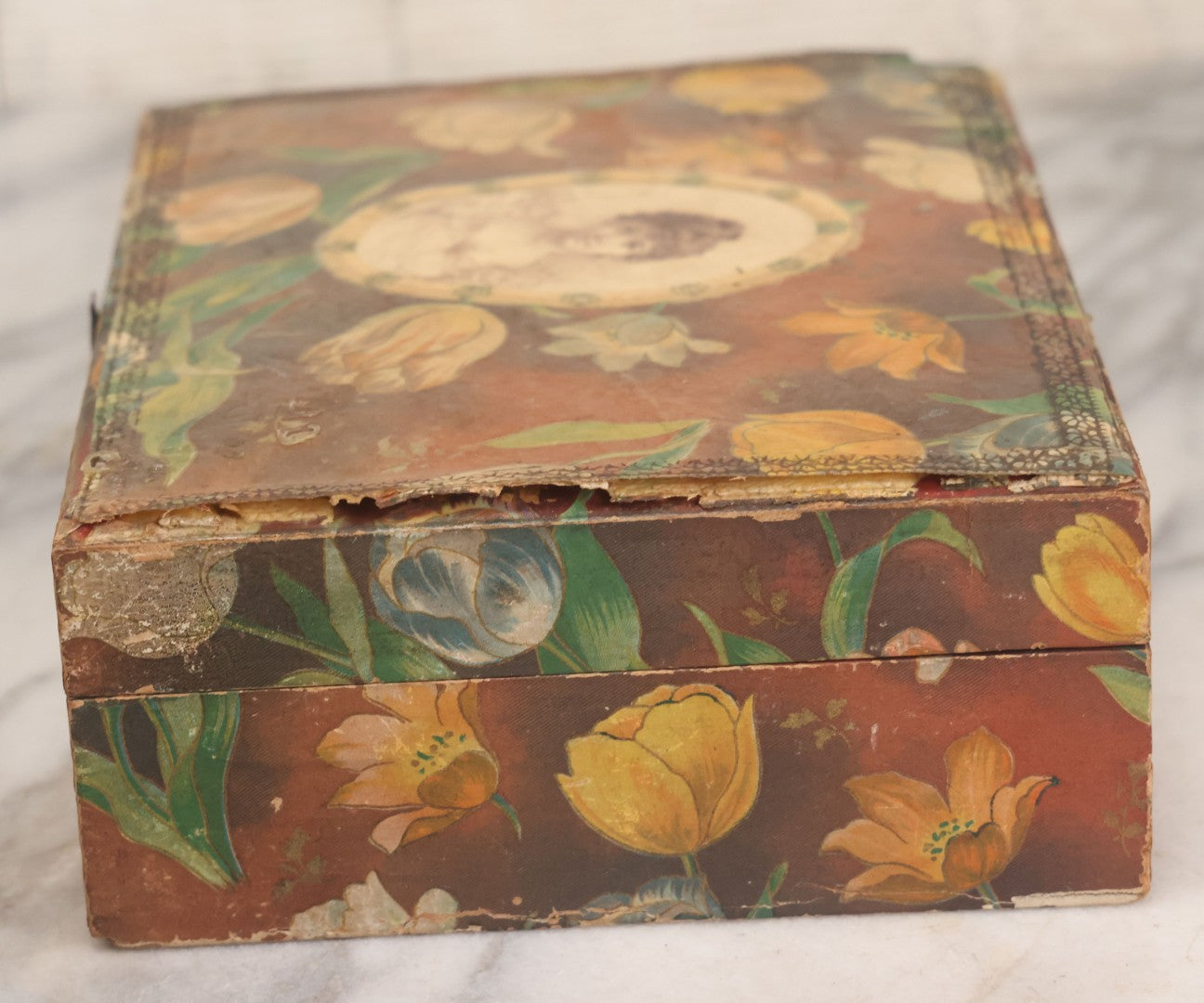 Lot 066 - Antique Victorian Celluloid Dresser Box With Woman In Dress, Floral Pattern On Cover, Tufted Green Interior, Note Cover Separation, Repair Glue Visible