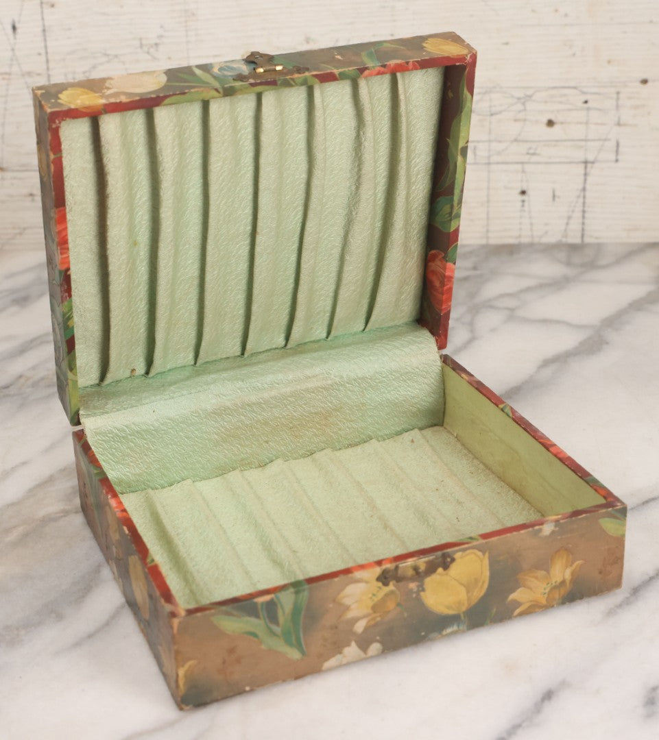 Lot 066 - Antique Victorian Celluloid Dresser Box With Woman In Dress, Floral Pattern On Cover, Tufted Green Interior, Note Cover Separation, Repair Glue Visible