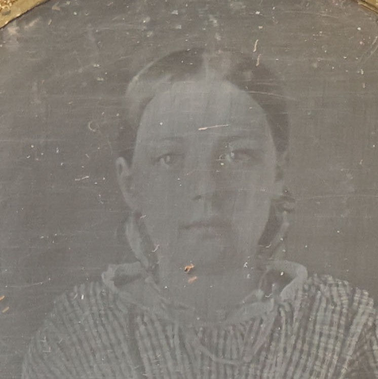 Lot 069 - Antique 1/6th Plate Daguerreotype Photograph Of Young Girl In Plaid Dress With Beaded Handbag Seated Beside A Table With Books In Half Leatherette Case