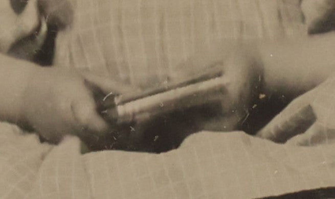 Lot 070 - Antique 1/6th Plate Ruby Ambrotype Photograph Of Smiling Little Girl With Red Tinted Cheeks, Curly Hair, Holding Books, Photograph Taken At Forbes New Gallery, Westfield, Massachusetts, In Half Leatherette Case